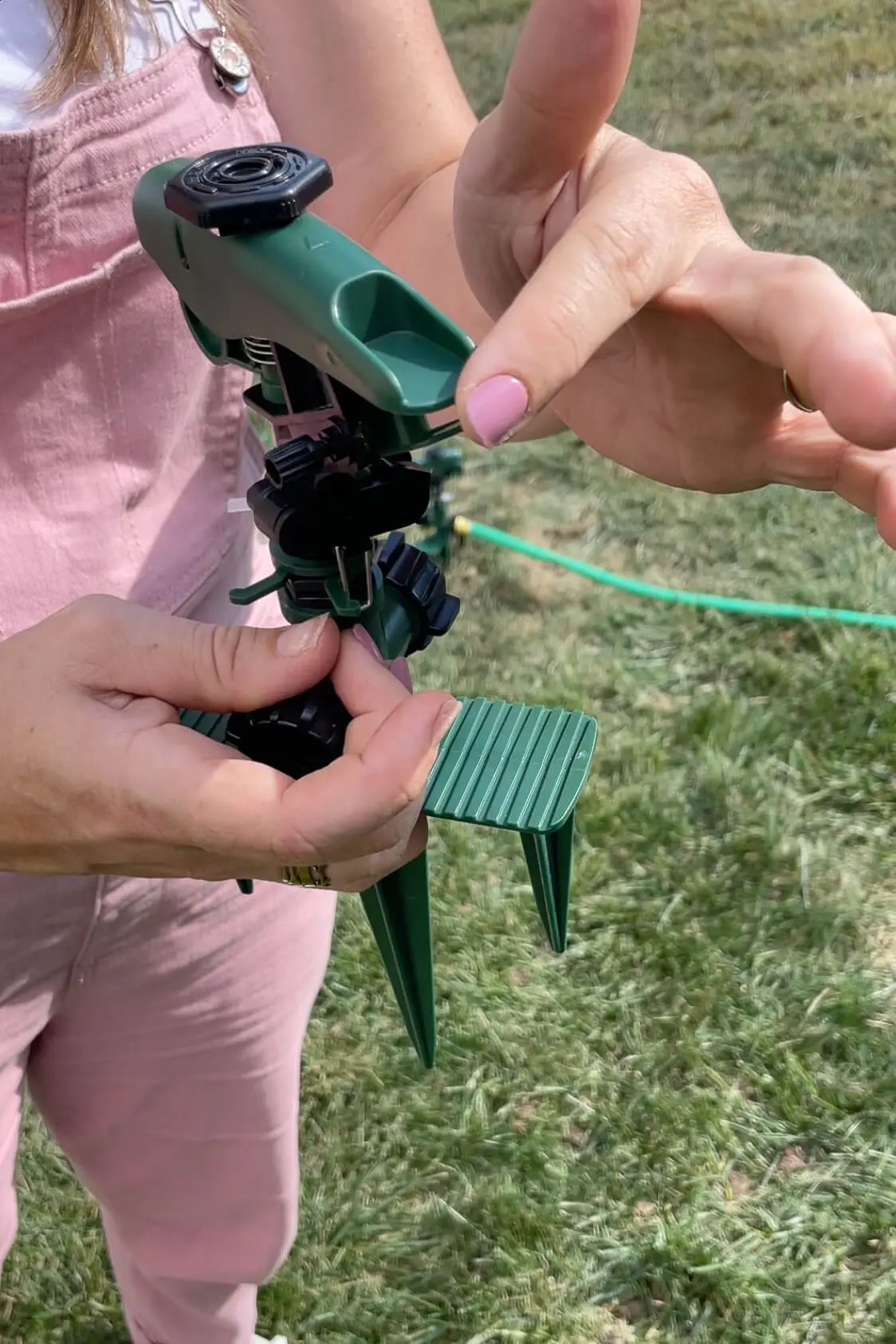 Adjusting your sprinklers for an automatic watering system.